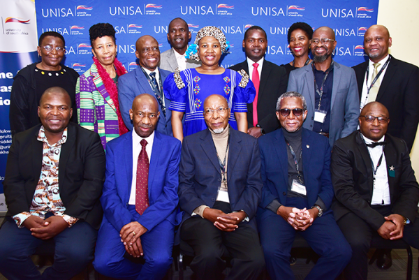 Front row, from left: Keynote speaker Prof Tebogo David wa Maahlamela (Director: Ditsong Museum of Cultural Heritage), Prof Moloko Sepota (Acting Registrar, Unisa), Dr Mosibudi Mangena (former Minister of Science and Technology), Prof Solomon Magano (Acting Vice-Principal: Institutional Development, Unisa), and Dr Moses Hlongwane (Executive Dean: College of Accounting Sciences, Unisa)  Back row, from left: Prof Mampaka Lydia Mojapelo (retired academic in African Languages, Unisa), Prof Madipoane Masenya (Office of the Principal and Vice-Chancellor, Unisa), Dr Lesiba Molepo (Acting Regional Director: North Eastern Region, Unisa), Ndavheleseni Ramakuela (Chief Director: Provincial Communication Services, Limpopo), Dr Mantepu MaseTshaba (Acting Executive Dean: College of Economic and Management Sciences, Unisa), Prof Maelekanyo Mulaudzi (Deputy Executive Dean: College of Economic and Management Sciences, Unisa), Dr Dephney Mathebula (Director: School of Economic and Financial Sciences, College of Economic and Management Sciences, Unisa), Manage Matsepe (brother of Dr OK Matsepe), and Dr Benni Lekubu (Acting Deputy Registrar: Governance)